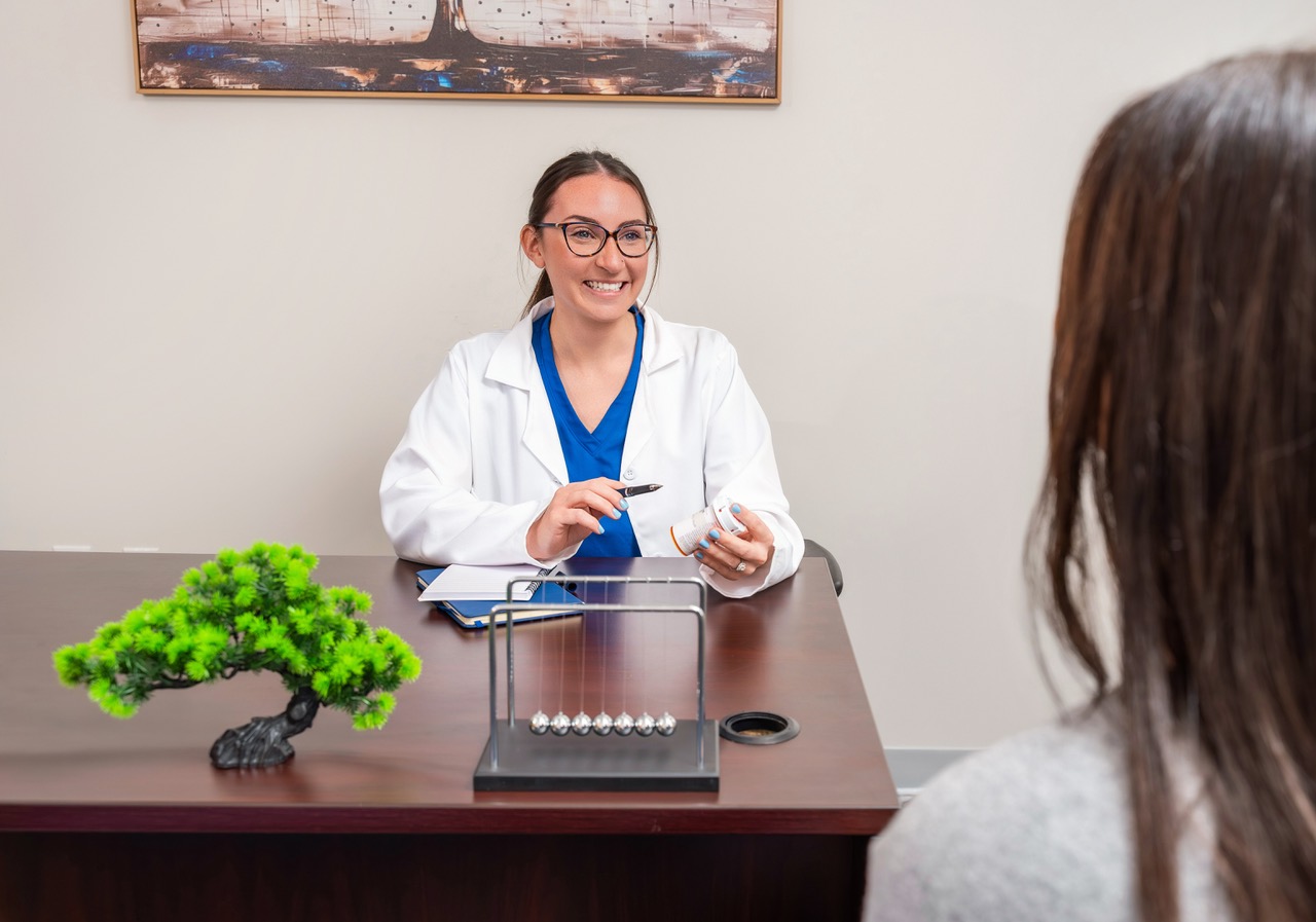 doctor discussing prescription with patient